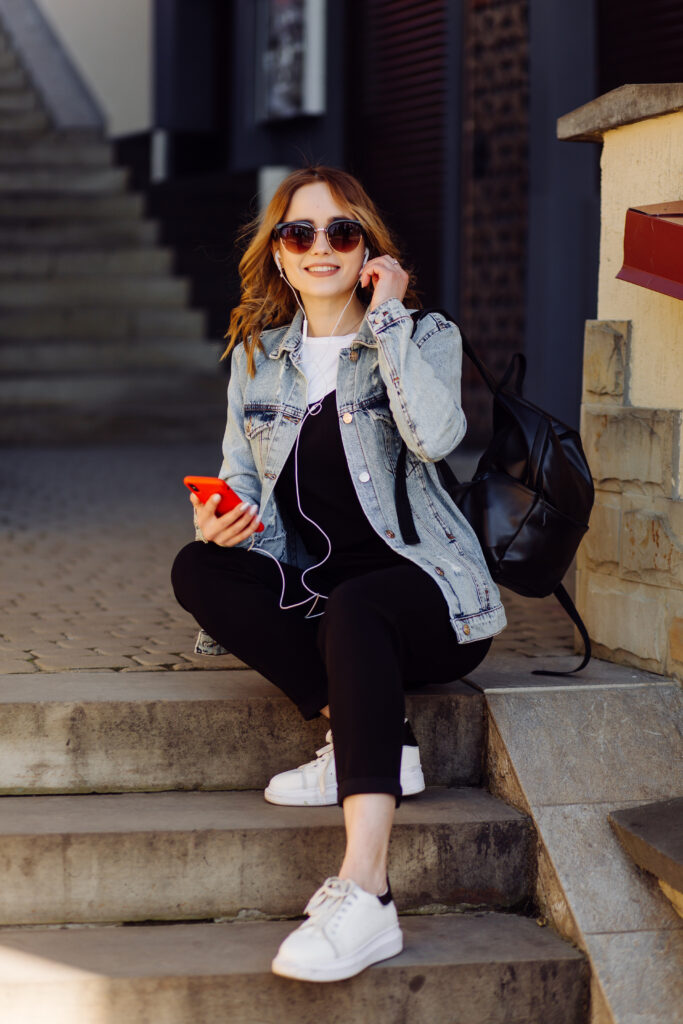 Denim jacket with white sneakers